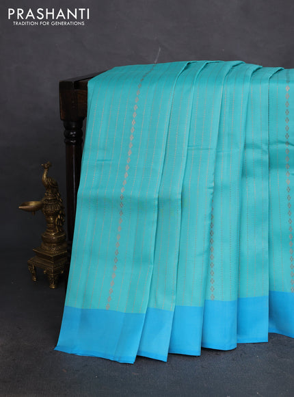 Kanchipuram silk saree teal blue and blue with allover copper zari weaves and simple border
