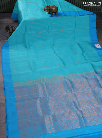 Kanchipuram silk saree teal blue and blue with allover copper zari weaves and simple border