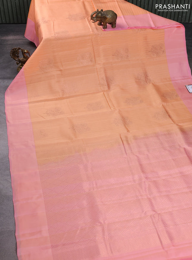 Kanchipuram silk saree peach orange and peach pink with allover copper zari weaves and simple border