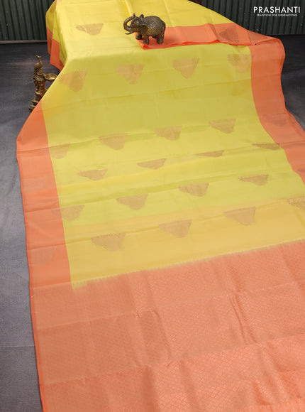 Kanchipuram silk saree yellow and orange with copper zari woven buttas and copper zari woven butta border