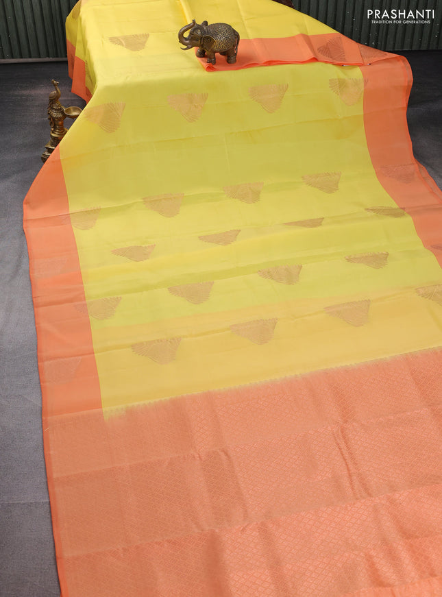 Kanchipuram silk saree yellow and orange with copper zari woven buttas and copper zari woven butta border