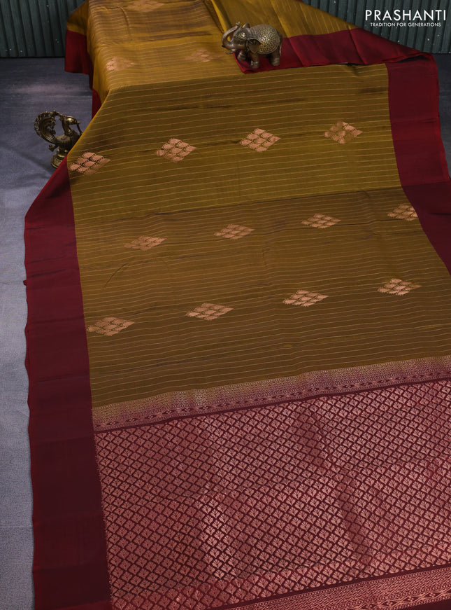 Kanchipuram silk saree dark mehendi green and maroon with allover zari weaves and simple border