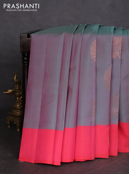 Kanchipuram silk saree dual shade of teal bluish pink and pink with copper zari woven buttas and copper zari woven butta border