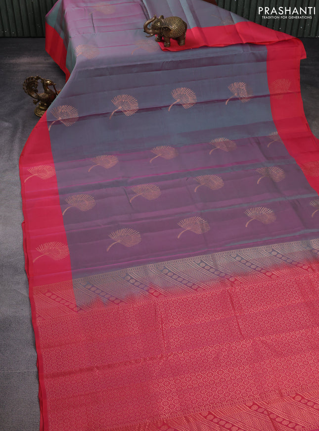 Kanchipuram silk saree dual shade of teal bluish pink and pink with copper zari woven buttas and copper zari woven butta border
