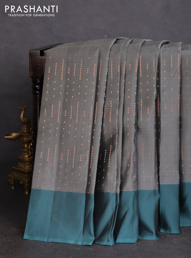 Kanchipuram silk saree grey and pastel green with allover copper zari weaves and simple border