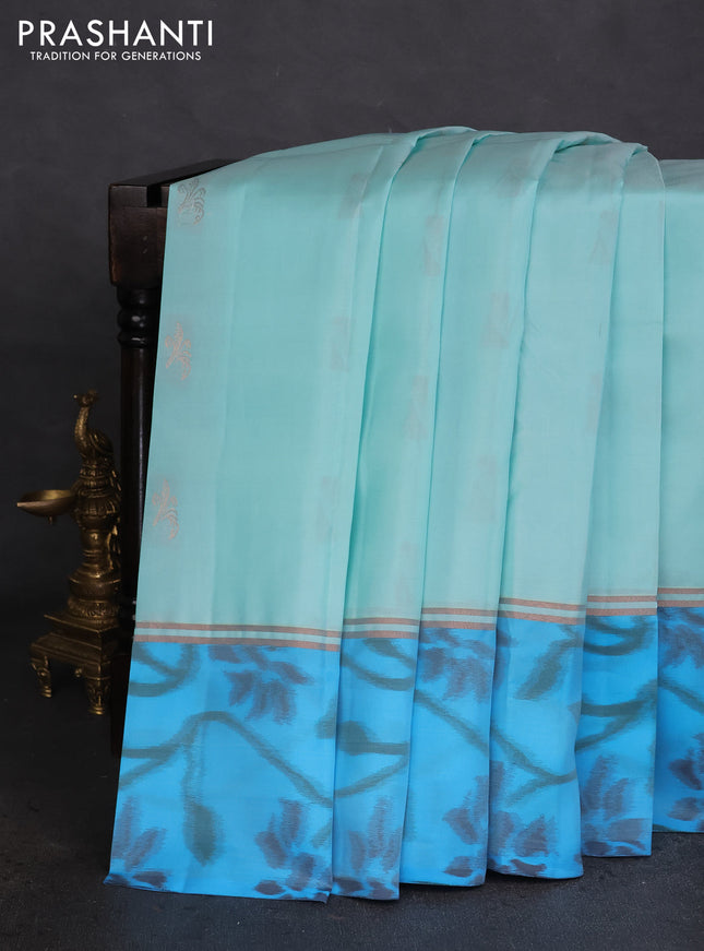 Kanchipuram silk saree teal blue and cs blue with allover copper zari weaves and zari woven ikat style border