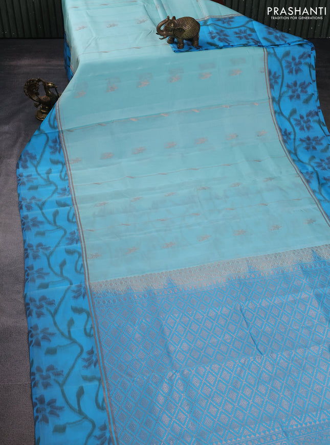 Kanchipuram silk saree teal blue and cs blue with allover copper zari weaves and zari woven ikat style border