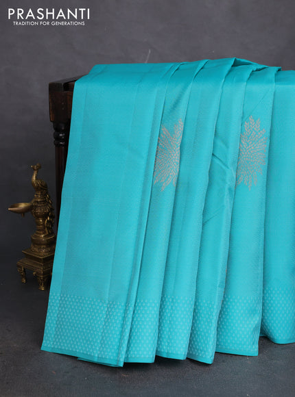 Kanchipuram silk saree teal blue and light pink with allover self emboss & zari buttas in borderless style