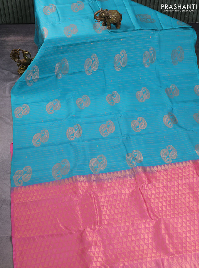 Kanchipuram silk saree teal blue and light pink with allover zari weaves in borderless style