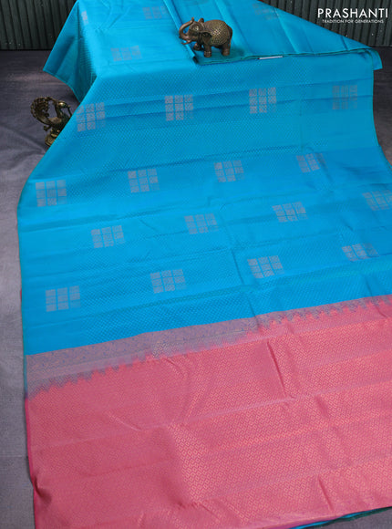 Kanchipuram silk saree dual shade of teal bluish pink and dark peach pink with allover self emboss & zari buttas in borderless style
