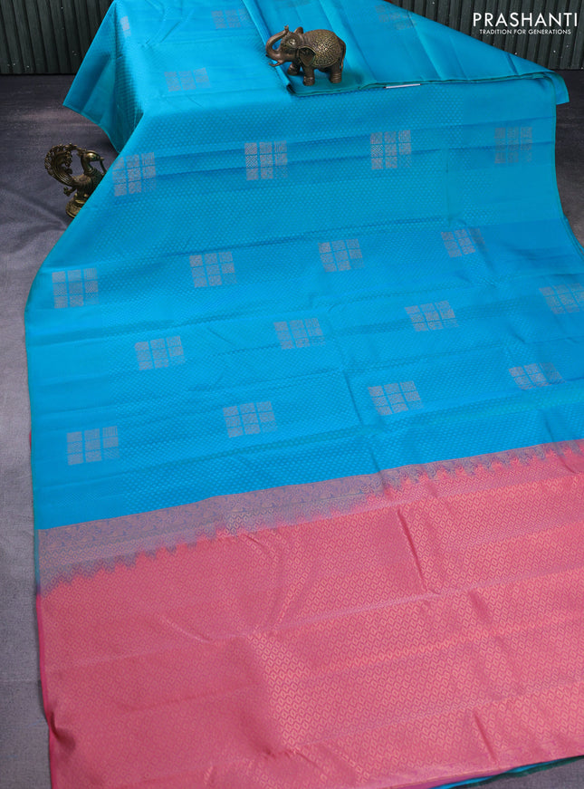 Kanchipuram silk saree dual shade of teal bluish pink and dark peach pink with allover self emboss & zari buttas in borderless style