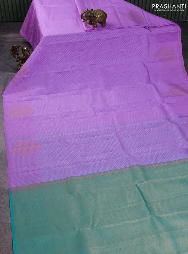Kanchipuram silk saree lavender and teal blue with allover self emboss & zari buttas in borderless style