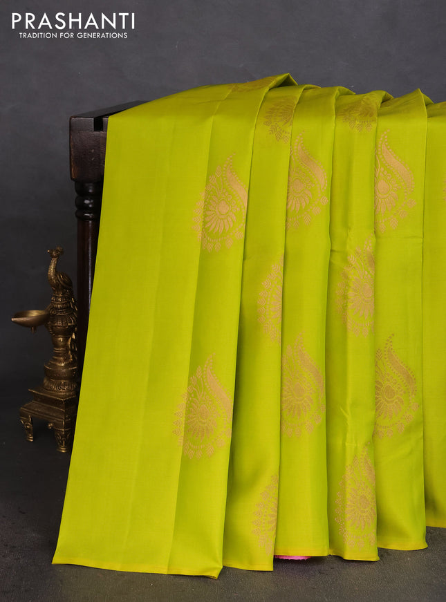 Kanchipuram silk saree lime yellow and light pink with copper zari woven buttas in borderless style