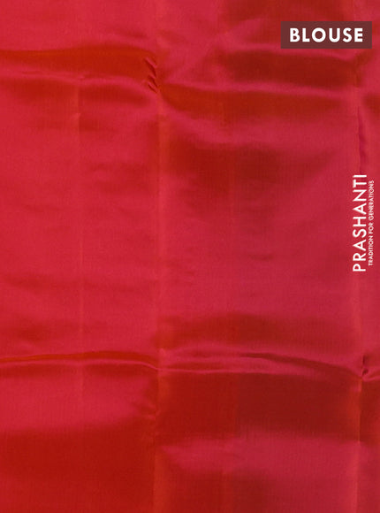 Kanchipuram silk saree teal blue and pinkish orange with copper zari woven buttas in borderless style