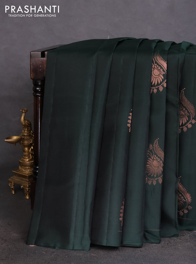 Kanchipuram silk saree bottle green and pinkish orange with copper zari woven buttas in borderless style