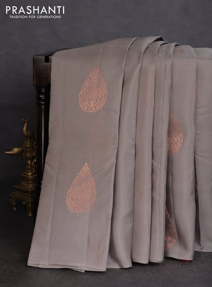 Kanchipuram silk saree grey and light pink with copper zari woven buttas in borderless style