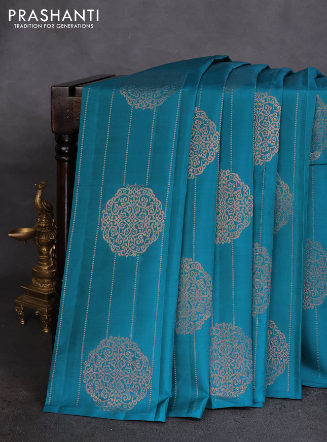 Kanchipuram silk saree peacock green and grey with allover zari weaves in borderless style