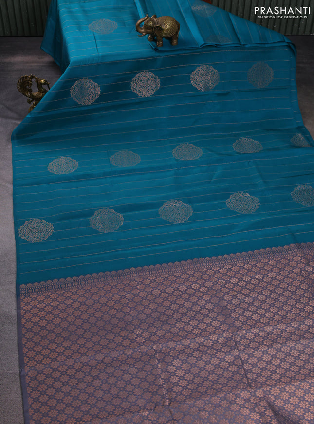 Kanchipuram silk saree peacock green and grey with allover zari weaves in borderless style