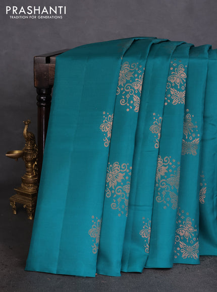 Kanchipuram silk saree teal green and pinksh orange with copper zari woven buttas in borderless style