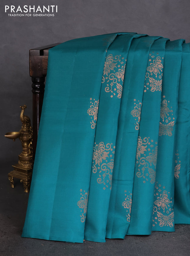 Kanchipuram silk saree teal green and pinksh orange with copper zari woven buttas in borderless style