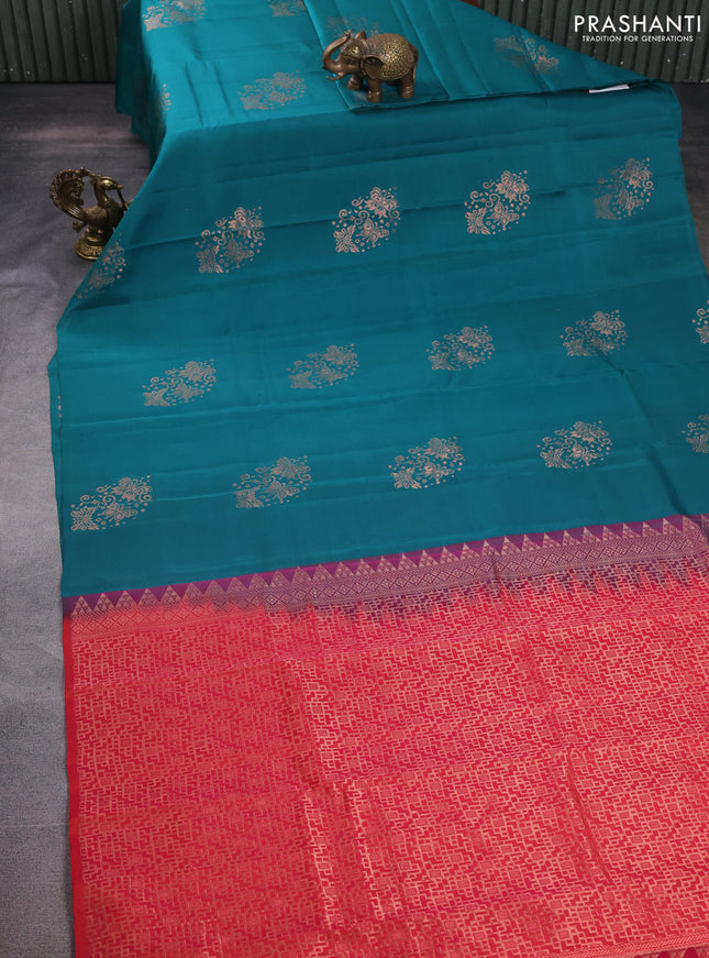 Kanchipuram silk saree teal green and pinksh orange with copper zari woven buttas in borderless style