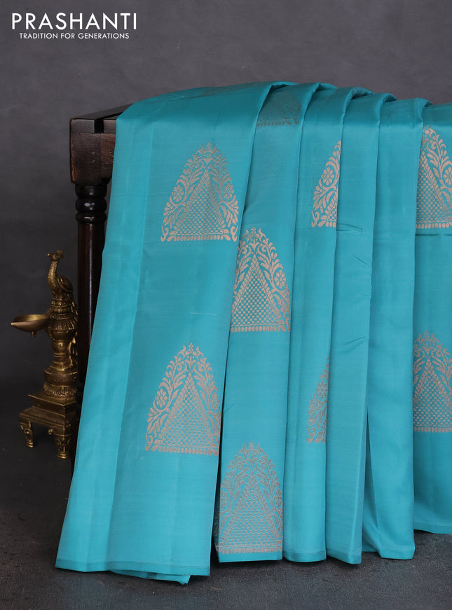 Kanchipuram silk saree teal blue and pink with copper zari woven buttas in borderless style