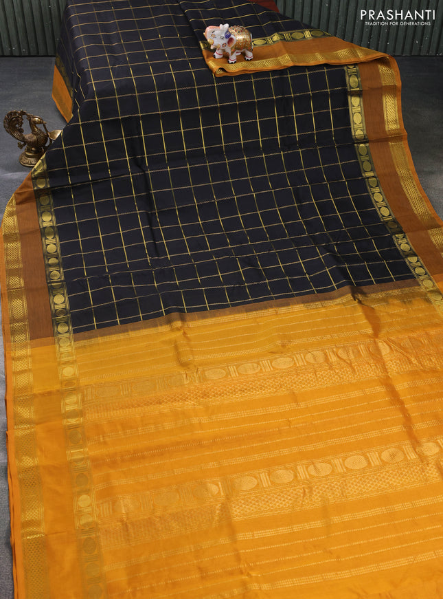 Silk cotton saree black and mustard yellow with zari checked pattern and rettapet zari woven border