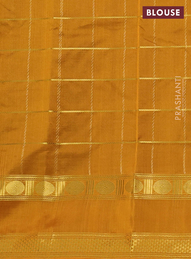 Silk cotton saree black and mustard yellow with zari checked pattern and rettapet zari woven border