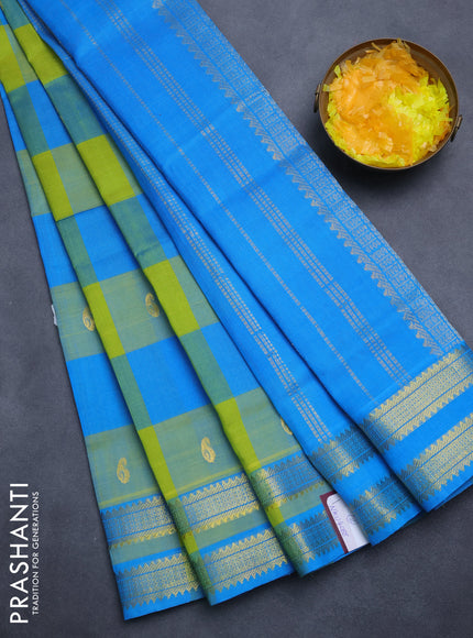 Silk cotton saree light green and cs blue with allover paalum pazham checks & paisley zari buttas and zari woven border