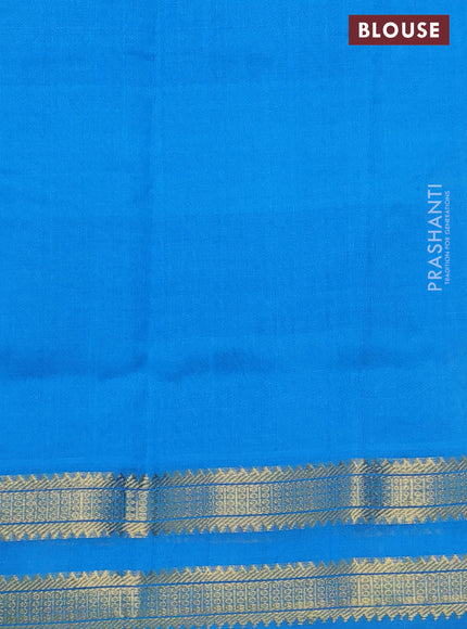 Silk cotton saree light green and cs blue with allover paalum pazham checks & paisley zari buttas and zari woven border
