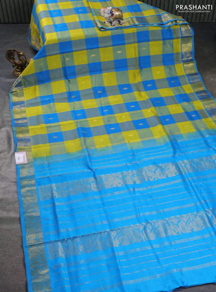 Silk cotton saree lime yellow and cs blue with allover paalum pazham checks & zari buttas and elephant zari woven border