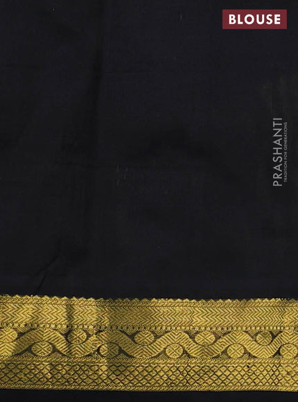 Silk cotton saree light green and black with allover paalum pazham checks & annam zari buttas and zari woven border
