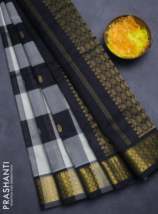 Silk cotton saree cream and black with allover paalum pazham checks & zari buttas and zari woven border