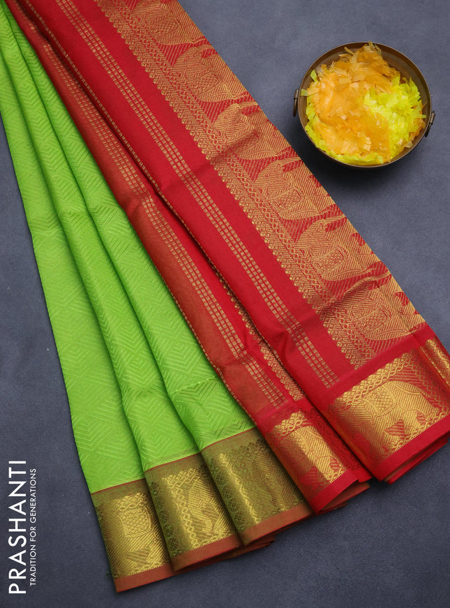 Silk cotton saree light green and red with allover self emboss jacquard and elephant zari woven border