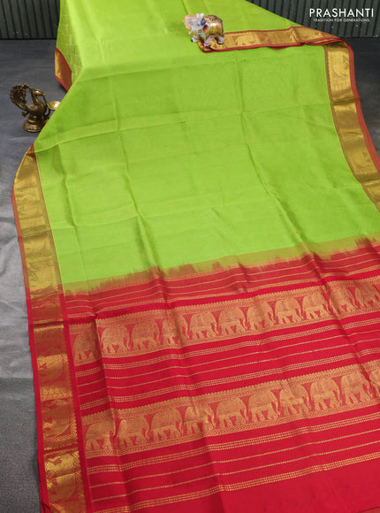 Silk cotton saree light green and red with allover self emboss jacquard and elephant zari woven border