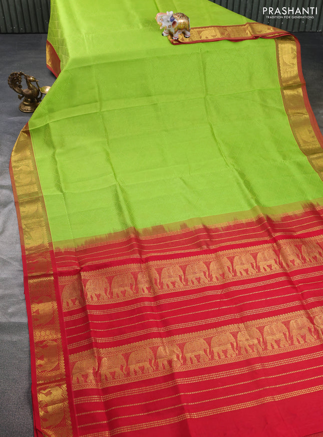 Silk cotton saree light green and red with allover self emboss jacquard and elephant zari woven border