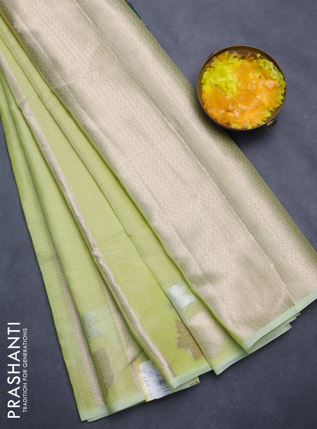 Cotton zari kota saree lime green with allover zari weaves and floral design butta border