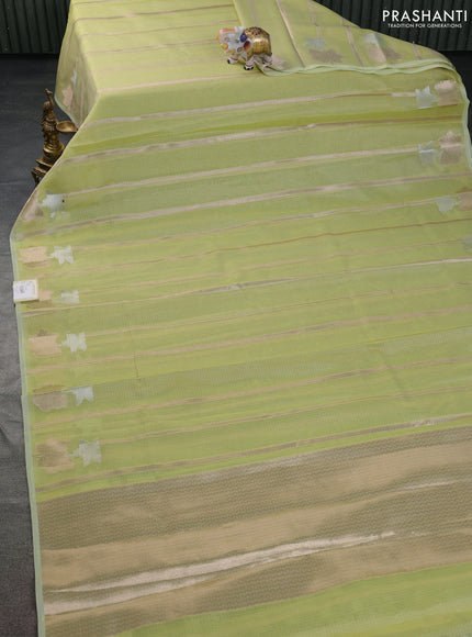 Cotton zari kota saree lime green with allover zari weaves and floral design butta border