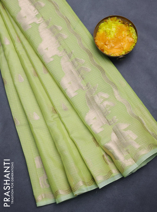 Cotton zari kota saree pista green with zari woven buttas and zari woven butta border