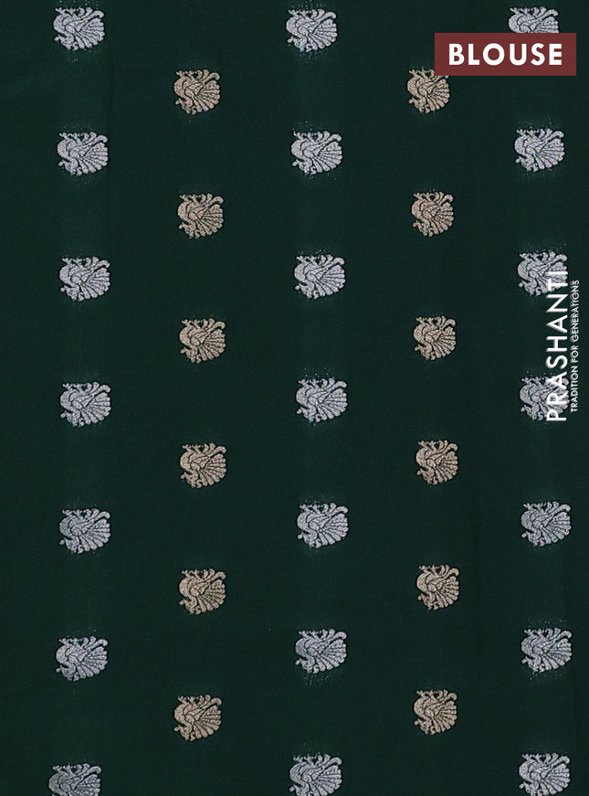 Cotton zari kota saree pista green with zari woven buttas and zari woven butta border