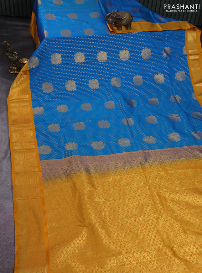 Semi kanchipuram silk saree cs blue and mustard yellow with allover zari weaves & buttas and zari woven korvai border