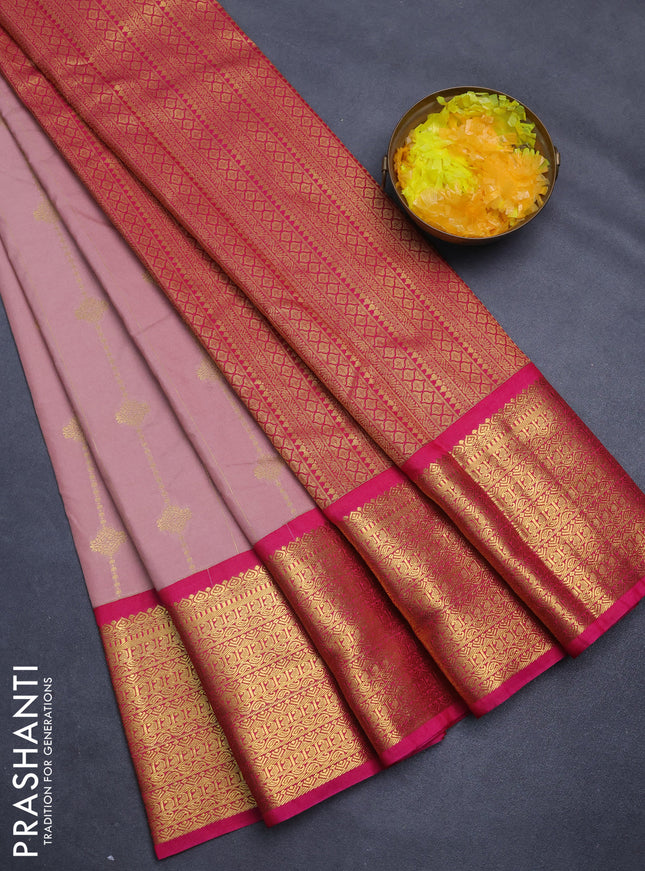 Semi kanchipuram silk saree pastel peach and pink with allover zari weaves and zari woven korvai border