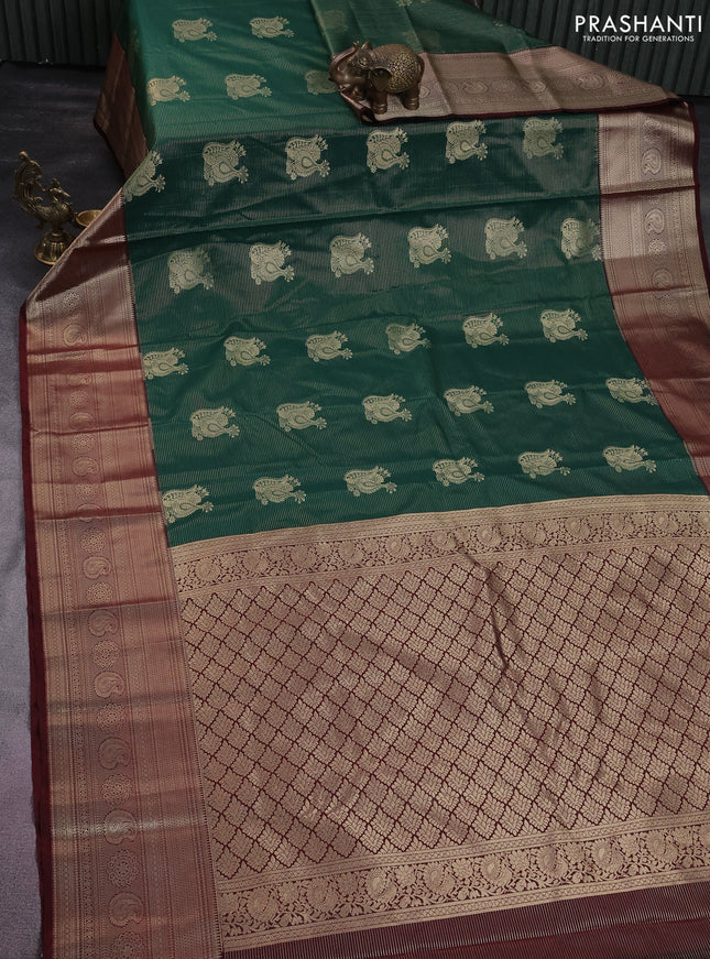 Semi kanchipuram silk saree green and maroon with allover zari weaves and long zari woven korvai border