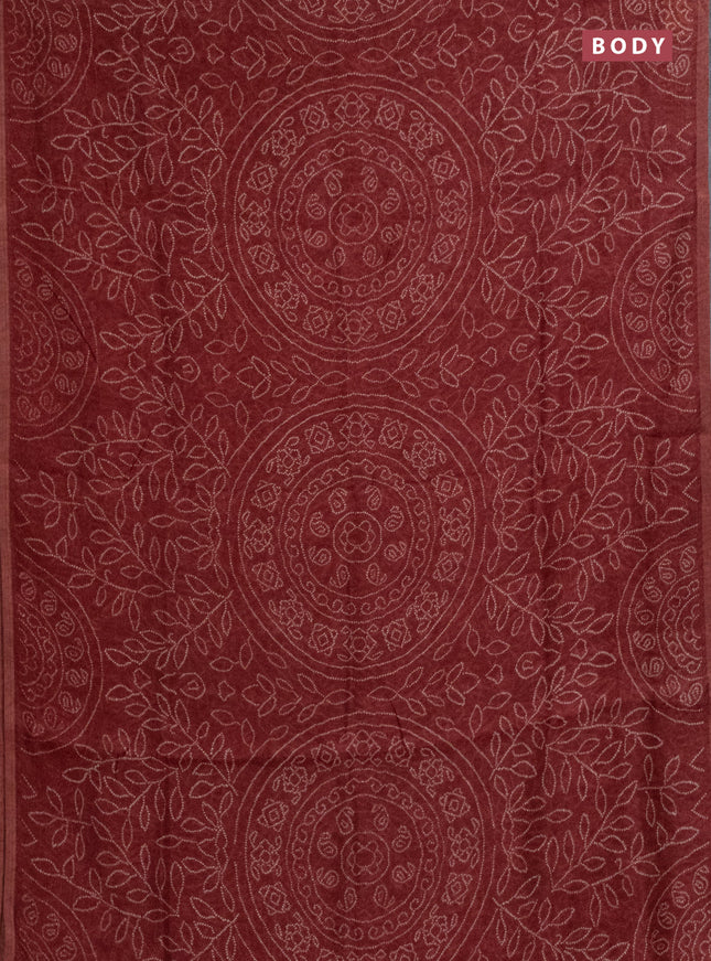 Semi linen saree maroon with allover bandhani prints and ajrakh printed pallu & blouse