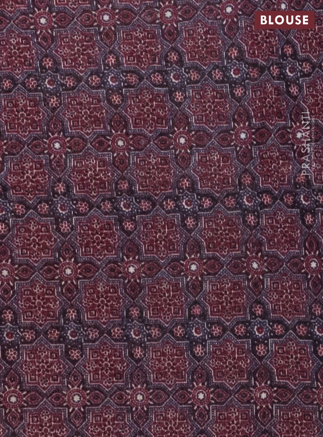 Semi linen saree maroon with allover bandhani prints and ajrakh printed pallu & blouse
