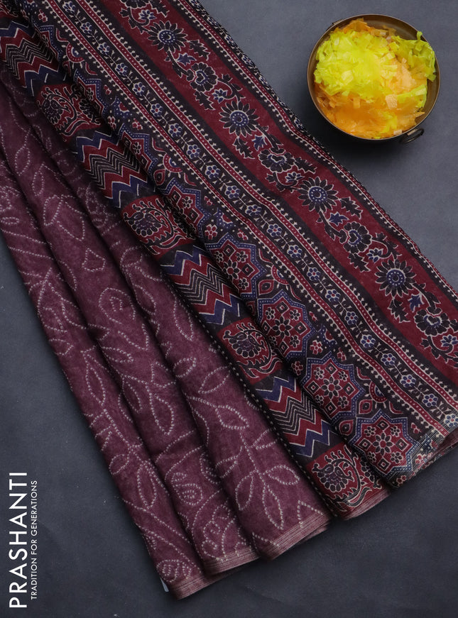 Semi linen saree wine shade with allover bandhani prints and ajrakh printed pallu & blouse