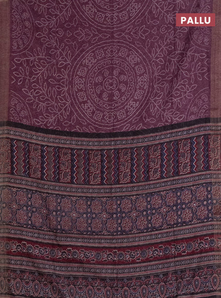 Semi linen saree wine shade with allover bandhani prints and ajrakh printed pallu & blouse