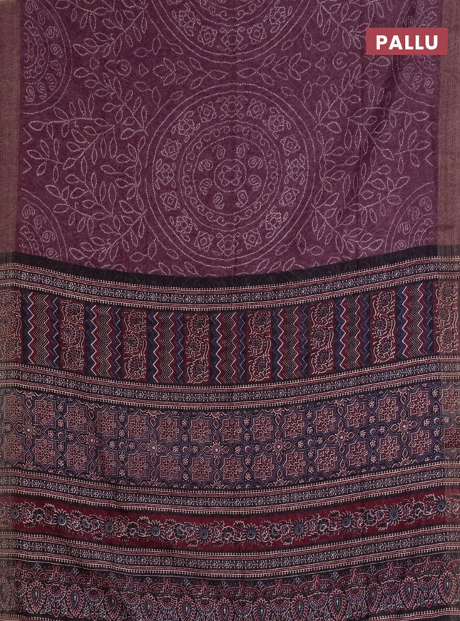 Semi linen saree wine shade with allover bandhani prints and ajrakh printed pallu & blouse