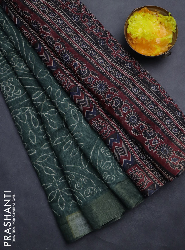 Semi linen saree bottle green with allover bandhani prints and ajrakh printed pallu & blouse