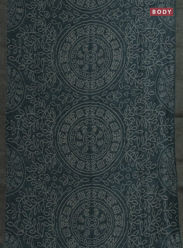 Semi linen saree bottle green with allover bandhani prints and ajrakh printed pallu & blouse